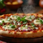 A visually striking pizza birria on a rustic wooden table.